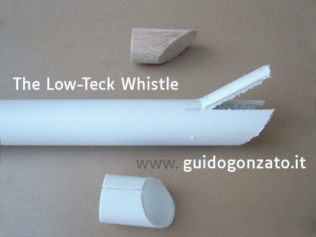 A PVC flute mouthpiece in separate parts: a wooden plug, a slightly cut tube and the small piece of tube that will cover the top of the mouthpiece.